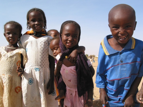 "Darfur Refugee Children Smile" Courtesy Internews Network (http://www.flickr.com/photos/internews/)